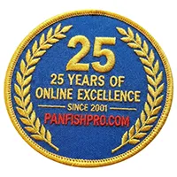 We are honored to announce the commemoration of our twenty-fifth anniversary of online operation. The accompanying image displays an embroidered circular patch inscribed with the text: “25 years of online excellence -Since 2001- Panfishpro.com.” The patch features gold trimming and gold lettering set against a blue background.
